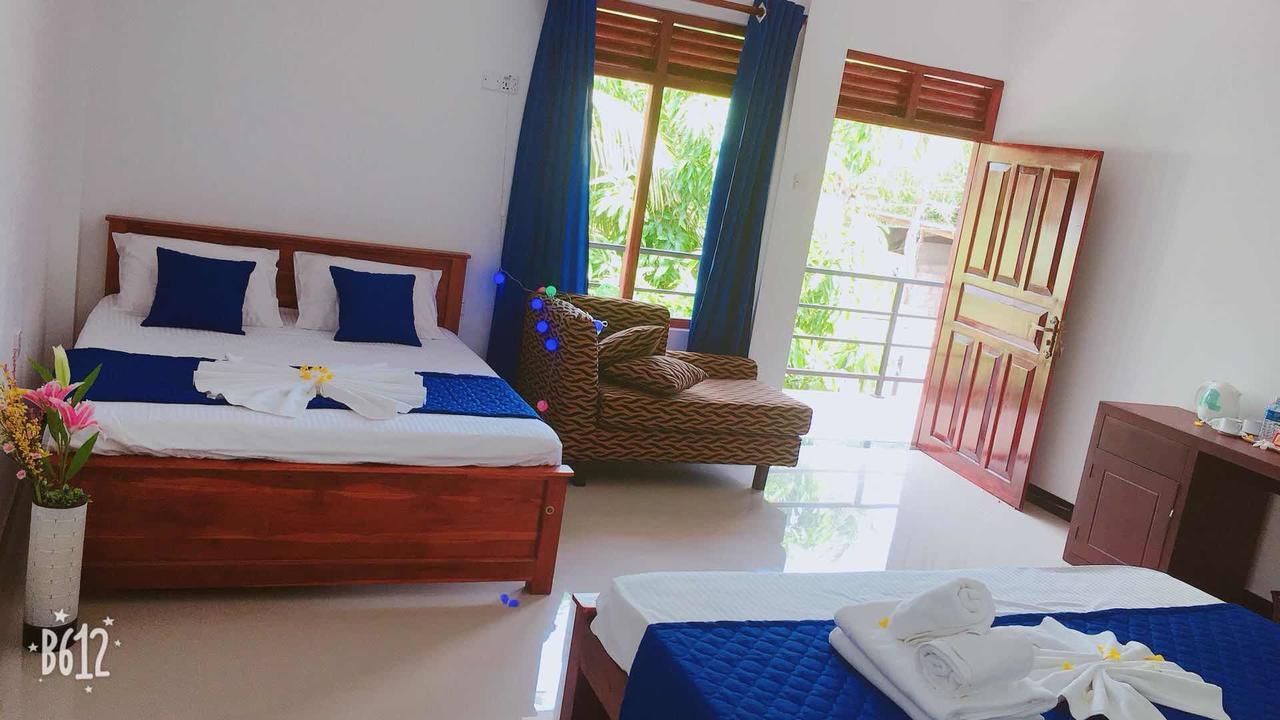 Blue Whale Holiday Hotel Мириса Екстериор снимка