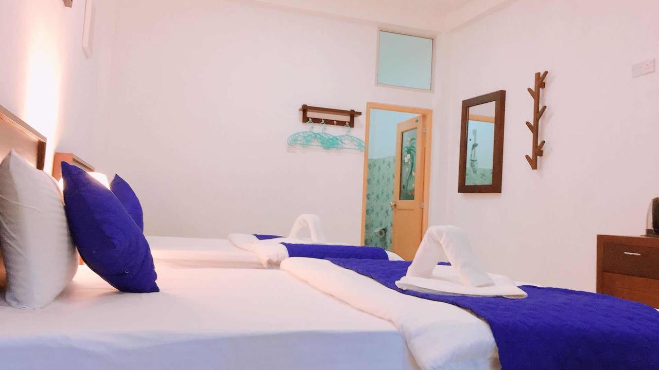 Blue Whale Holiday Hotel Мириса Екстериор снимка