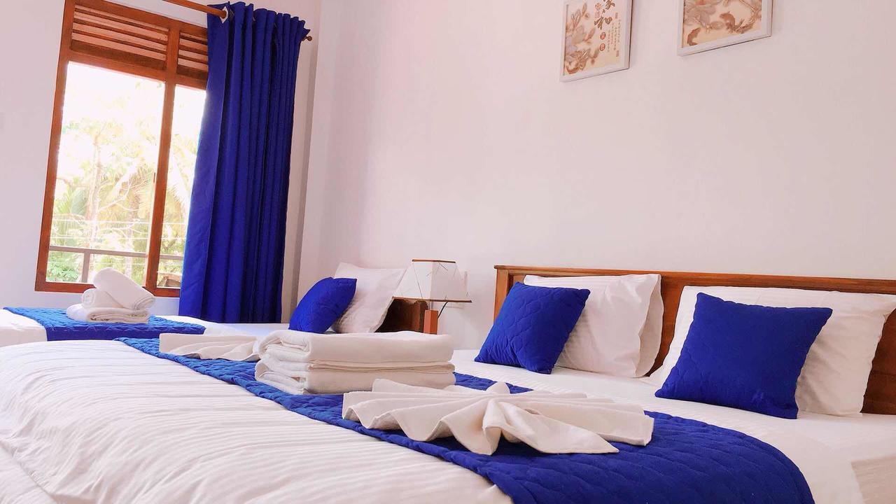 Blue Whale Holiday Hotel Мириса Екстериор снимка