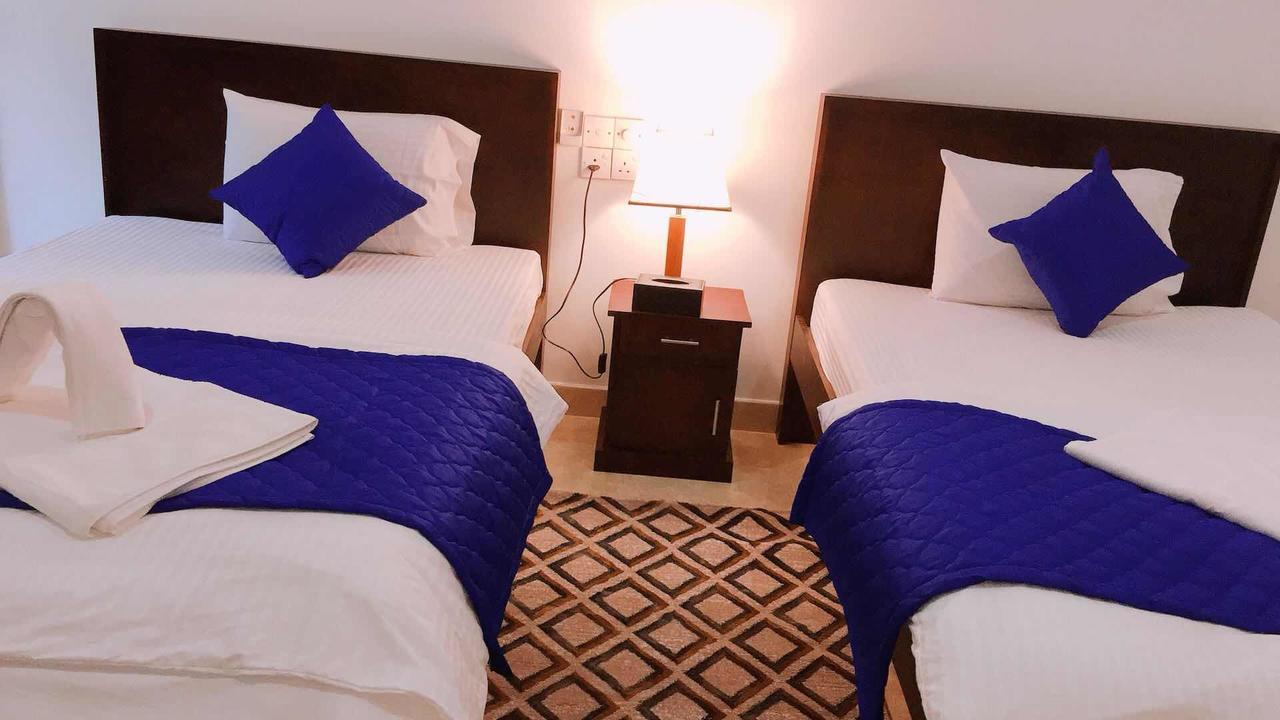 Blue Whale Holiday Hotel Мириса Екстериор снимка