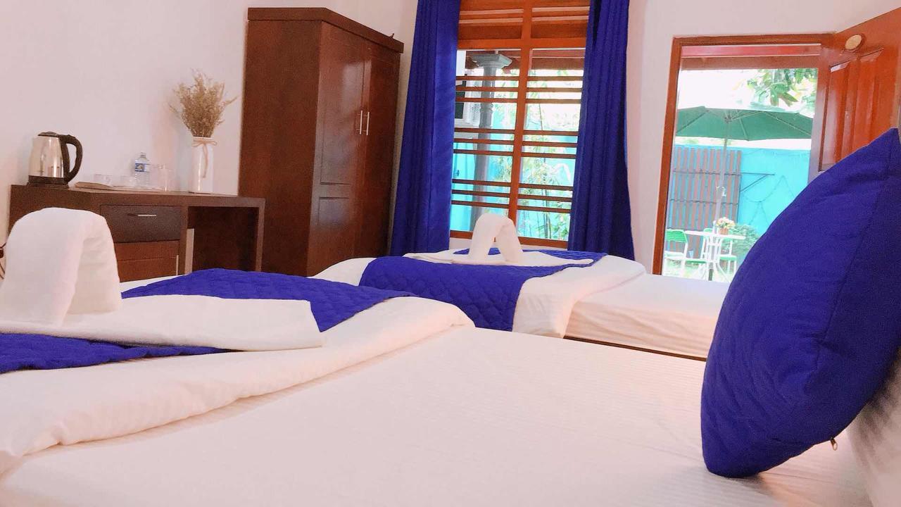 Blue Whale Holiday Hotel Мириса Екстериор снимка