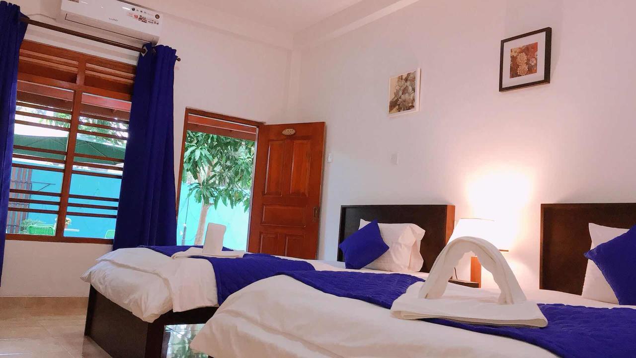 Blue Whale Holiday Hotel Мириса Екстериор снимка