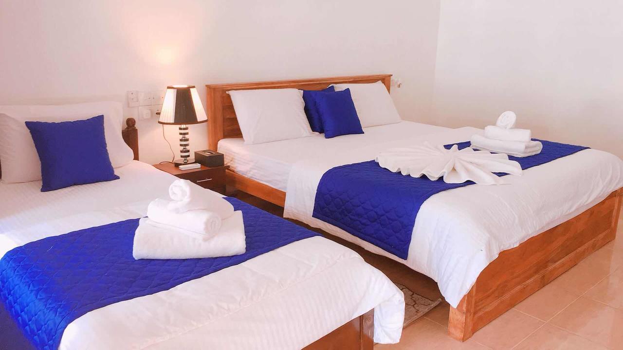 Blue Whale Holiday Hotel Мириса Екстериор снимка