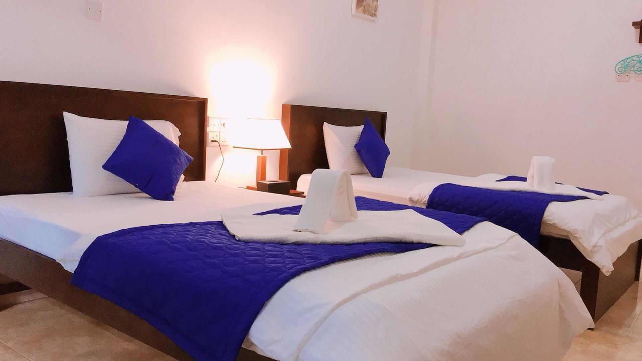 Blue Whale Holiday Hotel Мириса Екстериор снимка