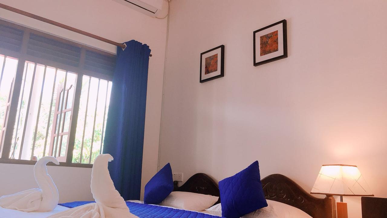 Blue Whale Holiday Hotel Мириса Екстериор снимка