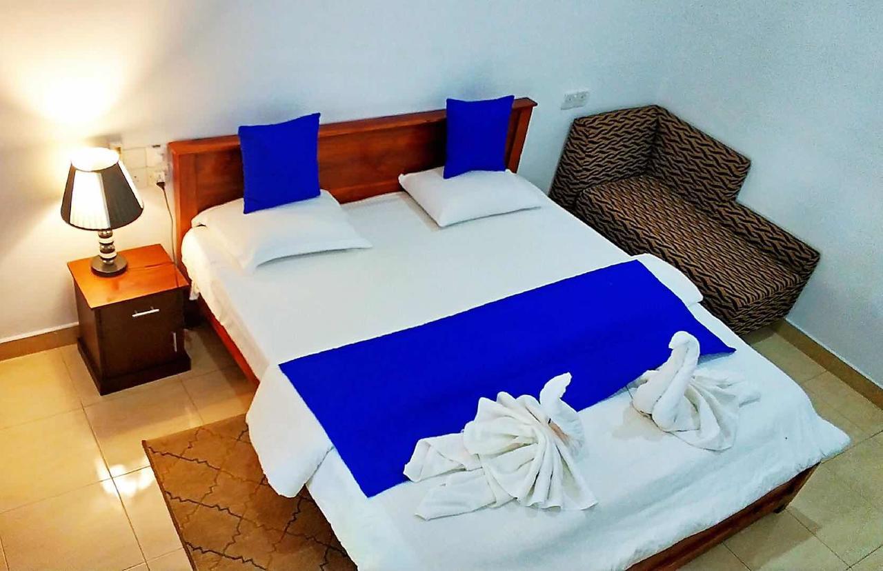 Blue Whale Holiday Hotel Мириса Екстериор снимка