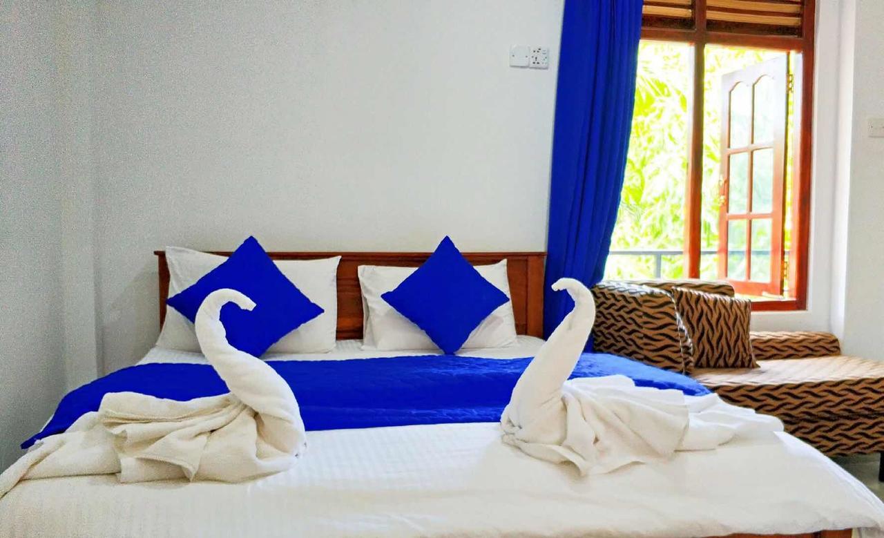 Blue Whale Holiday Hotel Мириса Екстериор снимка