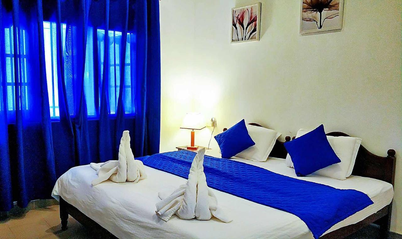 Blue Whale Holiday Hotel Мириса Екстериор снимка