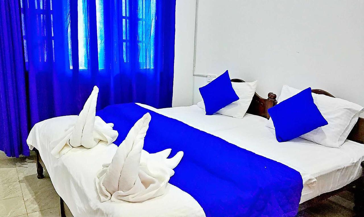 Blue Whale Holiday Hotel Мириса Екстериор снимка