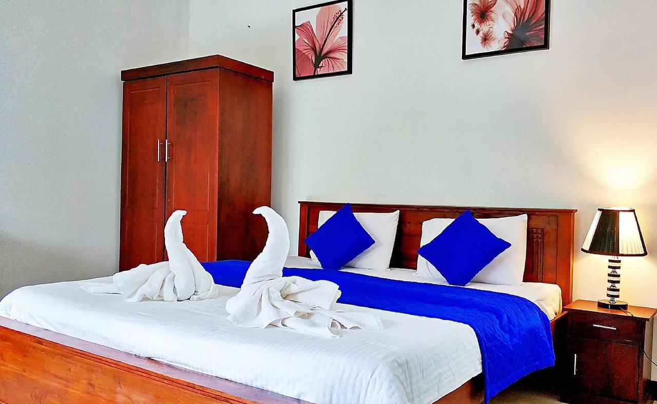 Blue Whale Holiday Hotel Мириса Екстериор снимка